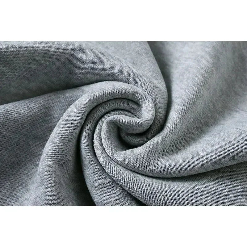 Soft gray fabric close-up showing texture of Fashion Kids Hoodies Cute Tayo Cartoon Graphic Print Boys Girls Sweatshirt Tops
