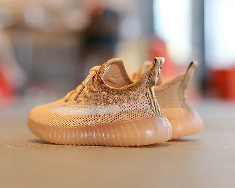 Fashion Kids Sneakers Breathable Non-slip Casual Running Shoes for Boys Girls in tan color with textured soles