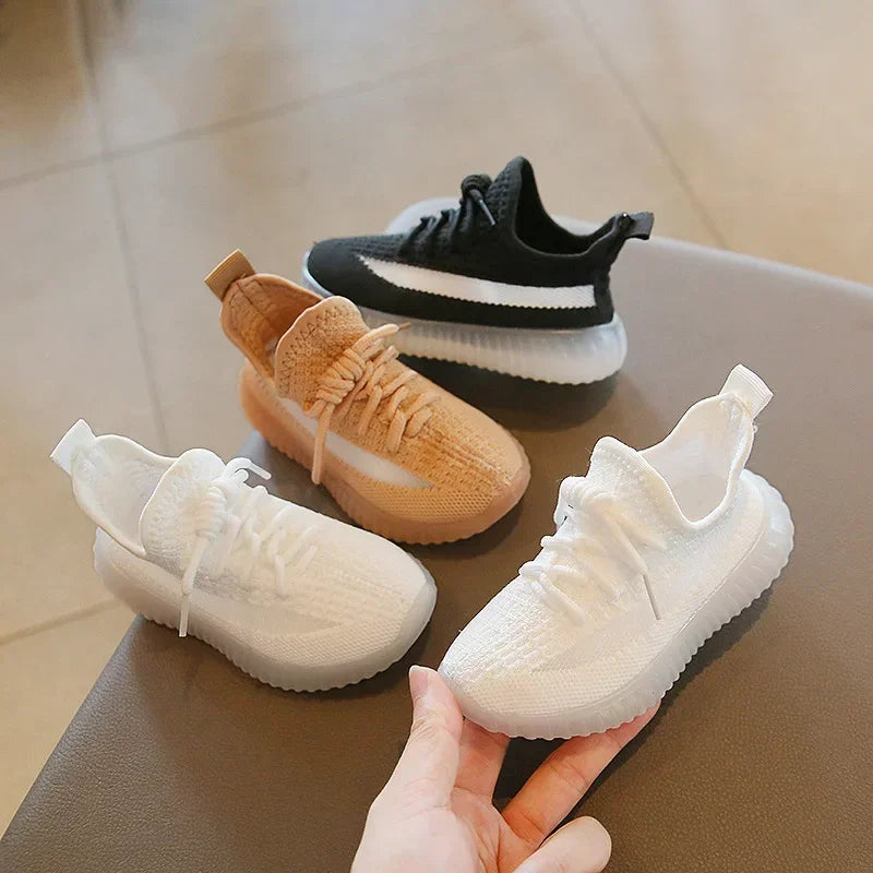 Fashion Kids Sneakers Breathable Non-slip Casual Running Shoes for Boys Girls in black, brown, and white colors