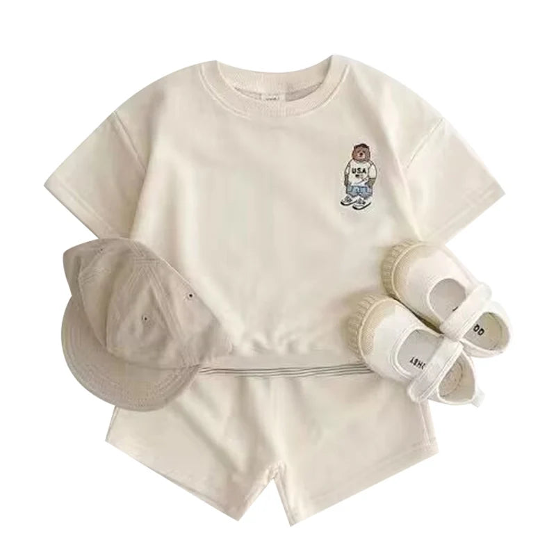 Fashion Kids Sports Bear Sweatshirt and Pants 2 Piece Fall Clothing Set in beige with matching hat and shoes