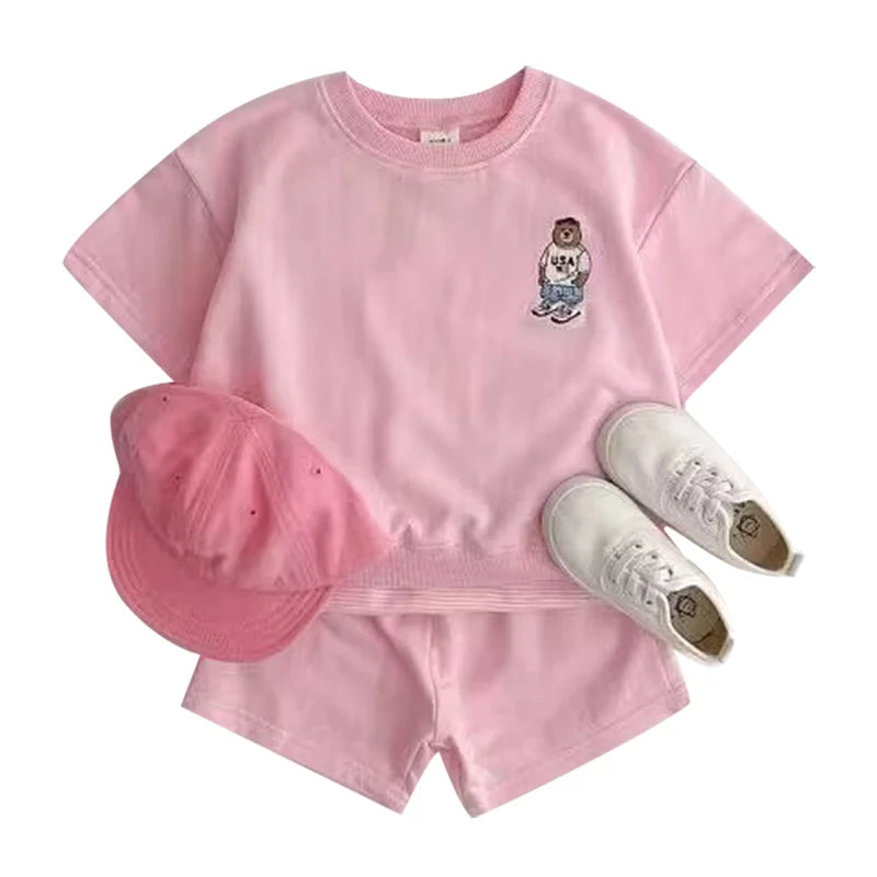 Fashion Kids Sports Bear Sweatshirt and Pants 2 Piece Fall Clothing Set in pink with matching hat and white sneakers