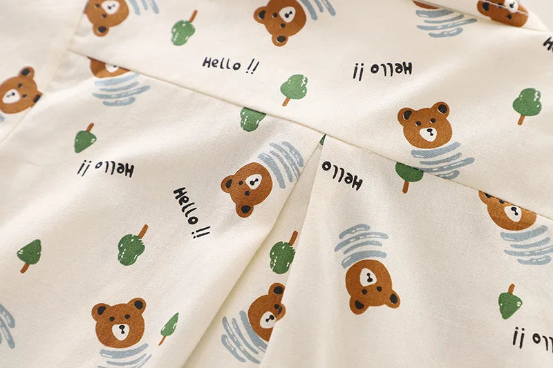 Fashion Summer Kids Cartoon T-Shirt and Denim Shorts 2PCS Casual Outfit Set with cute bear and tree prints on light fabric