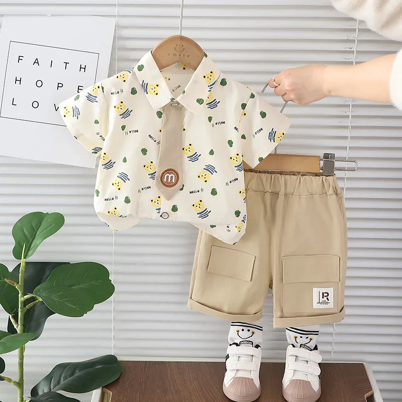 Fashion Summer Kids Cartoon T-Shirt and Denim Shorts 2PCS Casual Outfit Set with cute printed shirt and beige shorts
