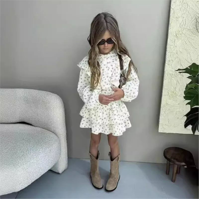 Fashion Baby Girl Clothes Set Floral Blouse and Layered Skirt 2PCS Outfit worn by girl with sunglasses and boots