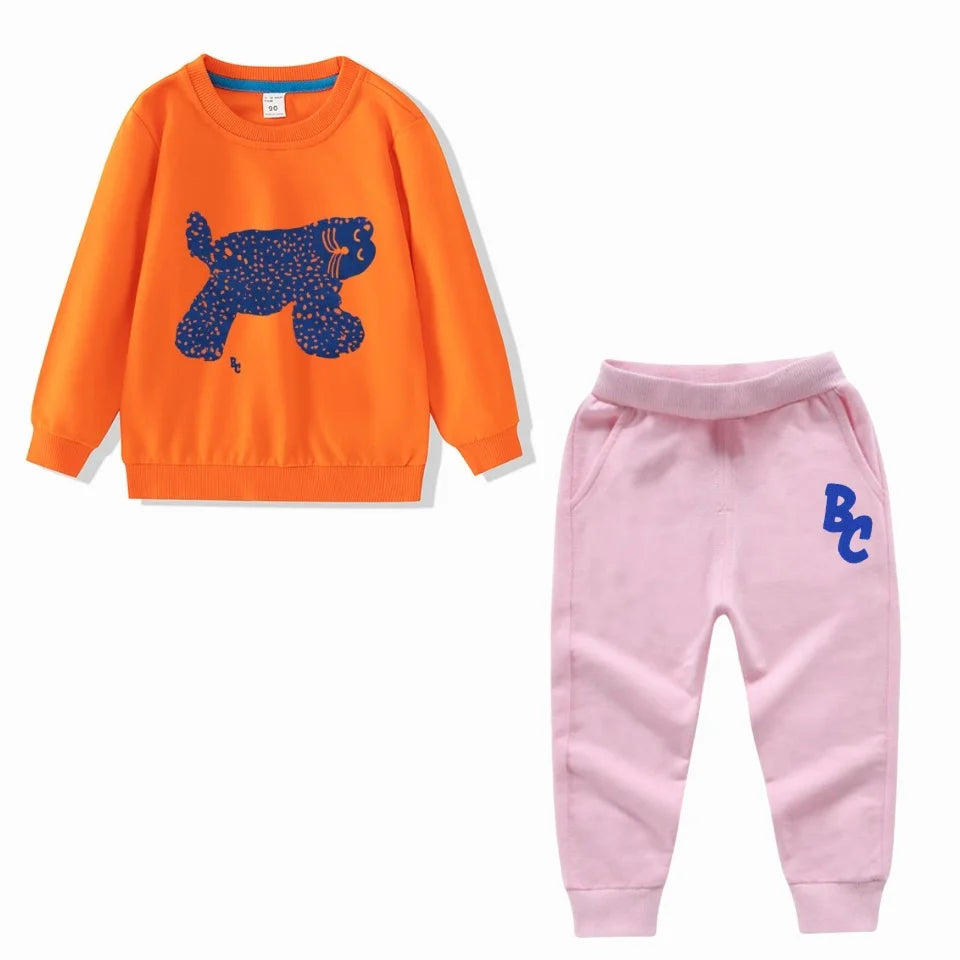 Full Sleeve Sweatshirts and Casual Pants Come with Fun Cartoon Designs featuring an orange sweatshirt with blue dog print and pink pants
