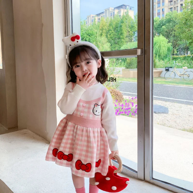 Girls Kawaii Hello Kitty Pink Knitted Cotton Princess Dress Cute Cartoon Style worn by toddler girl with matching headband and handbag