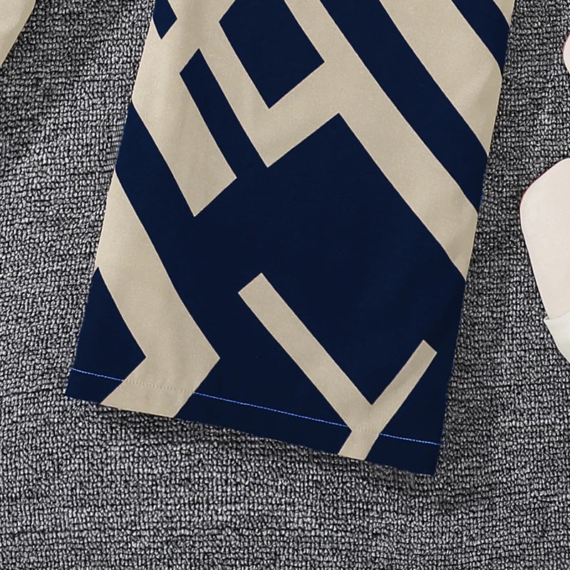 Close-up of Girls Khaki Off-Shoulder Top & Striped Pants Set fabric showing navy and khaki pattern details