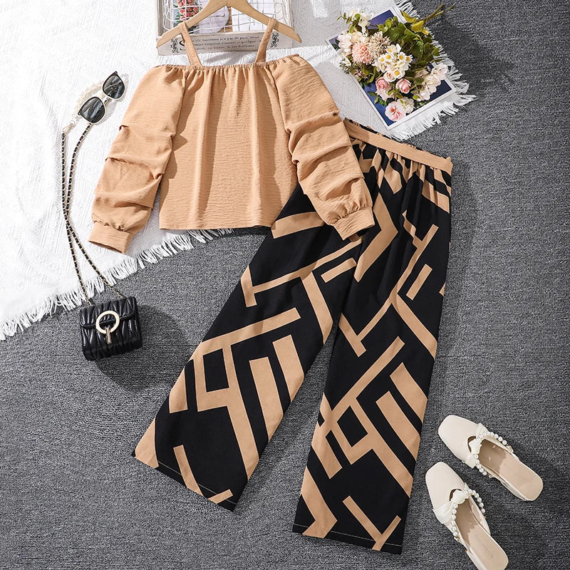 Girls Khaki Off-Shoulder Top & Striped Pants Set summer resort outfit laid out with sunglasses and shoes