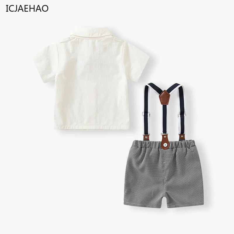 Boys White Short Sleeve Shirt and Shorts Two-Piece Summer Party Outfit with suspenders from Yamza Tots' Closet