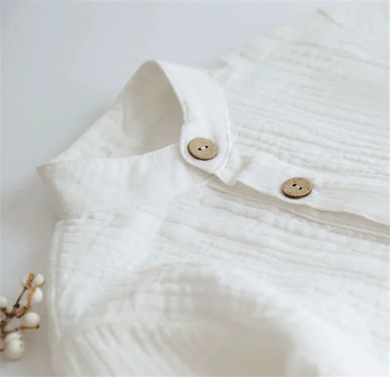Close-up of white Infant Baby Clothes Set Long Sleeve Shirt and Loose Pants for Party Wear by Yamza Tots' Closet