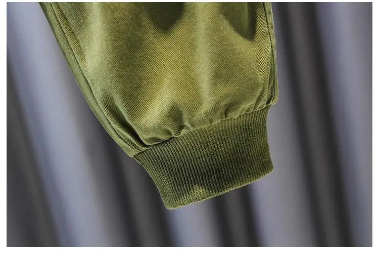 Close-up of green cuff detail on pants from Kids Boy Clothing Set New Handsome Fashion Baby Work Style Shirt Pants Two Piece