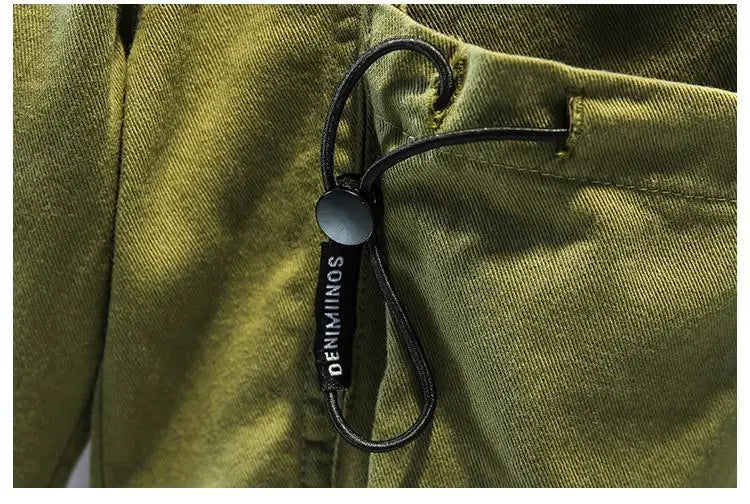 Close-up of green fabric detail with black cord and button from Kids Boy Clothing Set New Handsome Fashion Baby Work Style Shirt Pants Two Piece
