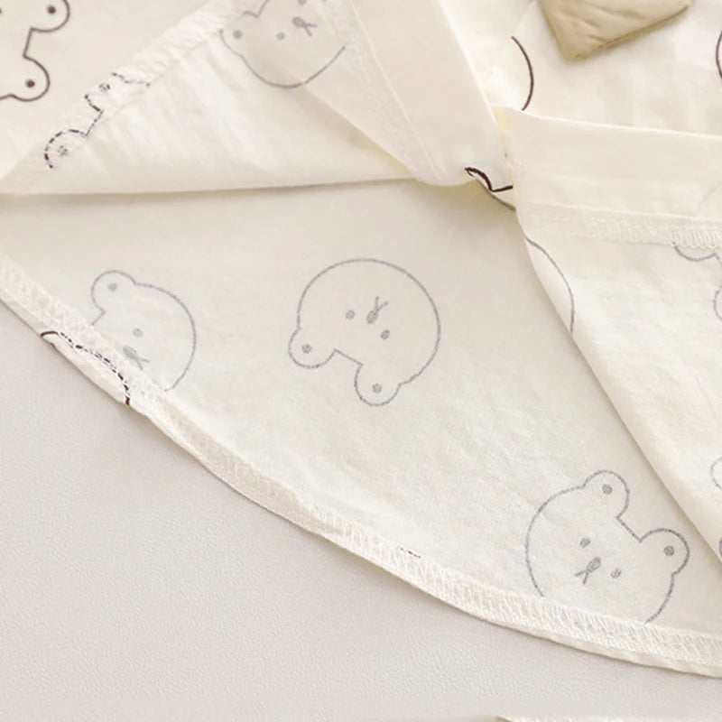 Close-up of soft white fabric with cute bear cartoon prints from Kids Boys Cartoon Clothing Sets Baby Tee Shirt Pants Toddler T-shirt Shorts Outfit