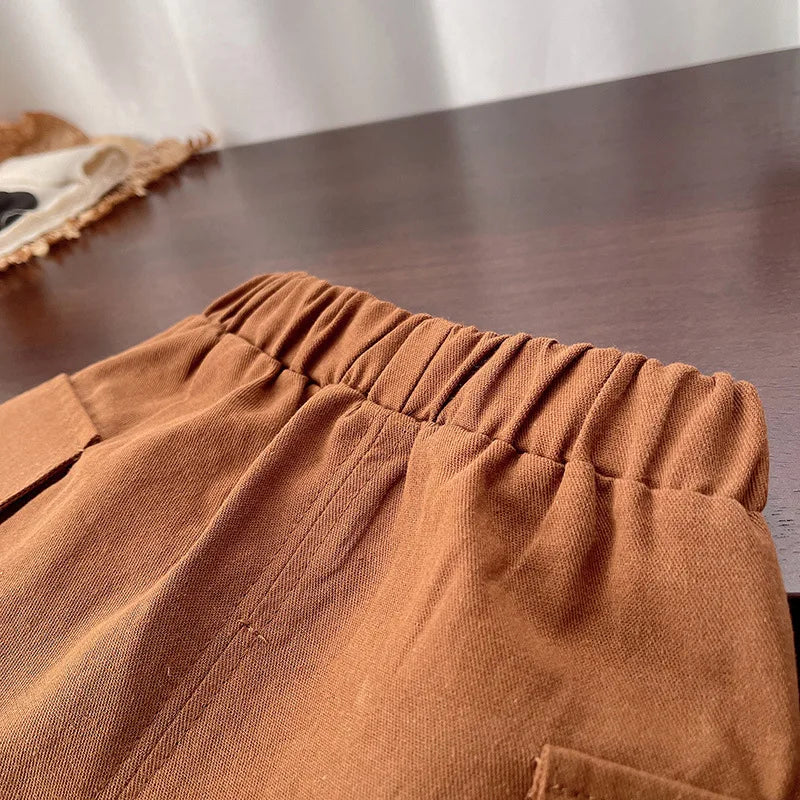 Close-up of brown toddler pants with elastic waistband from Kids Boys Striped Clothing Sets Baby T-Shirt Pants Toddler Casual Outfits Suits