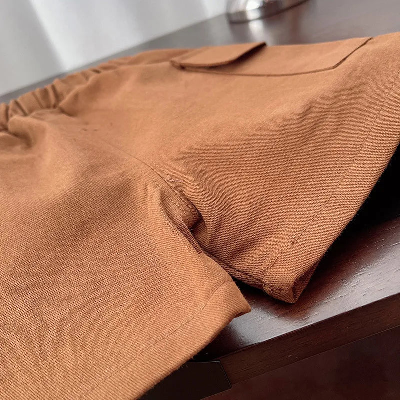 Close-up of brown toddler pants from Kids Boys Striped Clothing Sets Baby T-Shirt Pants Toddler Casual Outfits Suits