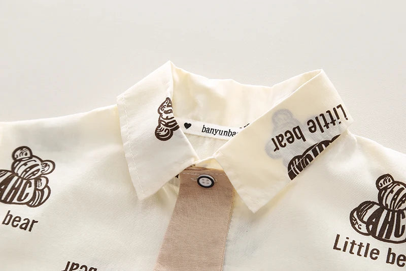 Close-up of cream shirt collar with brown bear print Kids Boys Summer Cotton Clothes Bear Print Tie Shirt Shorts 2PCS Toddler Set