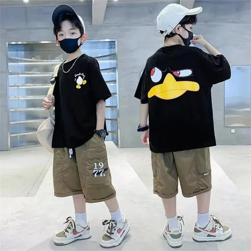 Kids Cartoon Print Cotton T-shirt Streetwear Style Short Sleeve Top Unisex in black with cartoon design worn by child