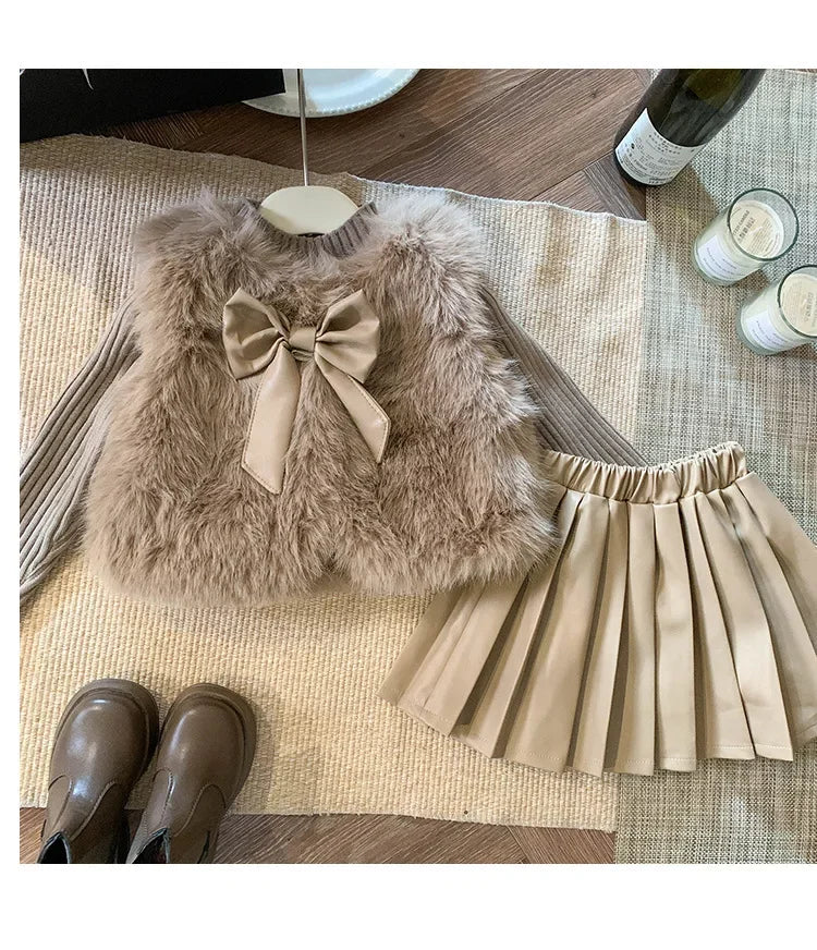 Kids Clothing Sets Furry Coat Knitted Top Pleated Leather Skirt 3pcs Outfit in beige and brown tones with boots