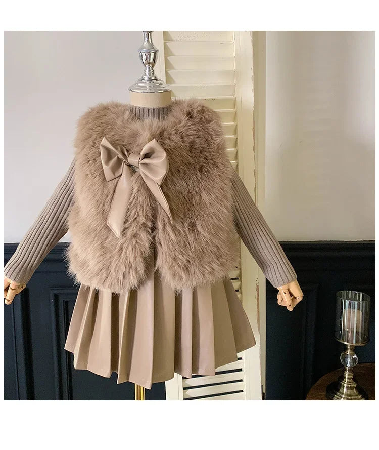 Kids Clothing Sets Furry Coat Knitted Top Pleated Leather Skirt 3pcs Outfit in beige on mannequin