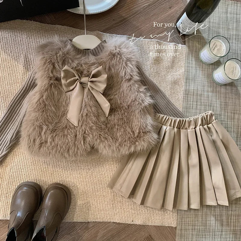 Kids Clothing Sets Furry Coat Knitted Top Pleated Leather Skirt 3pcs Outfit in beige tones with bow detail