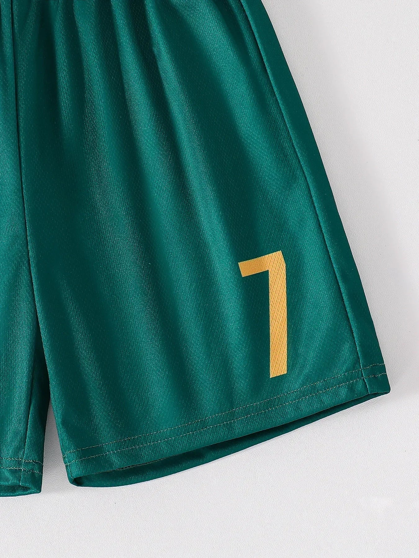 Green shorts with number 7 detail from Kids' Fall Boys' Fashion Quick-Dry T-Shirt and Shorts Two-Piece Outfit