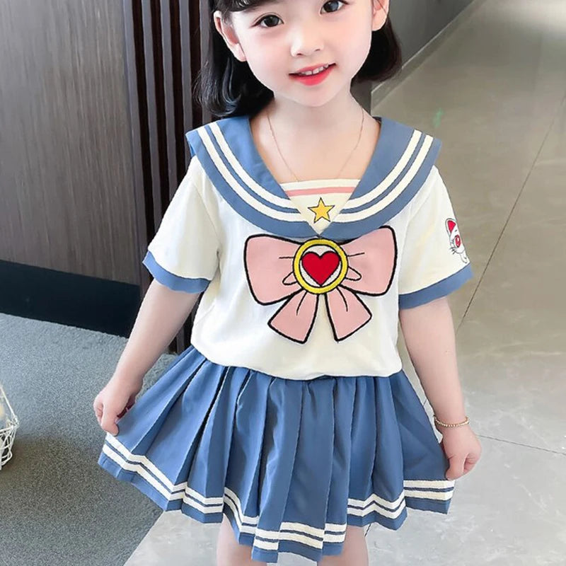 Kids Girls Cartoon Bow T-Shirt and Pleated Skirt Set Sailor Moon Cosplay Outfit worn by young girl