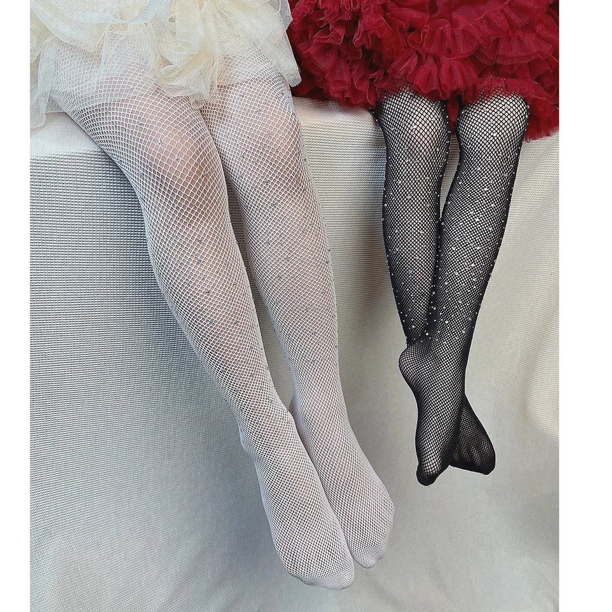 Kids Rhinestone Glitter Fishnet Tights Baby Girl Stockings Socks Accessories in white and black on two children wearing dresses