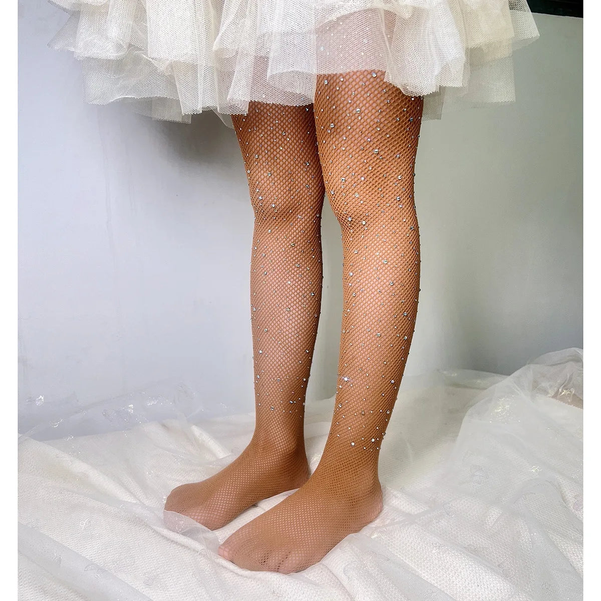 Kids Rhinestone Glitter Fishnet Tights Baby Girl Stockings Socks Accessories worn by child in white dress