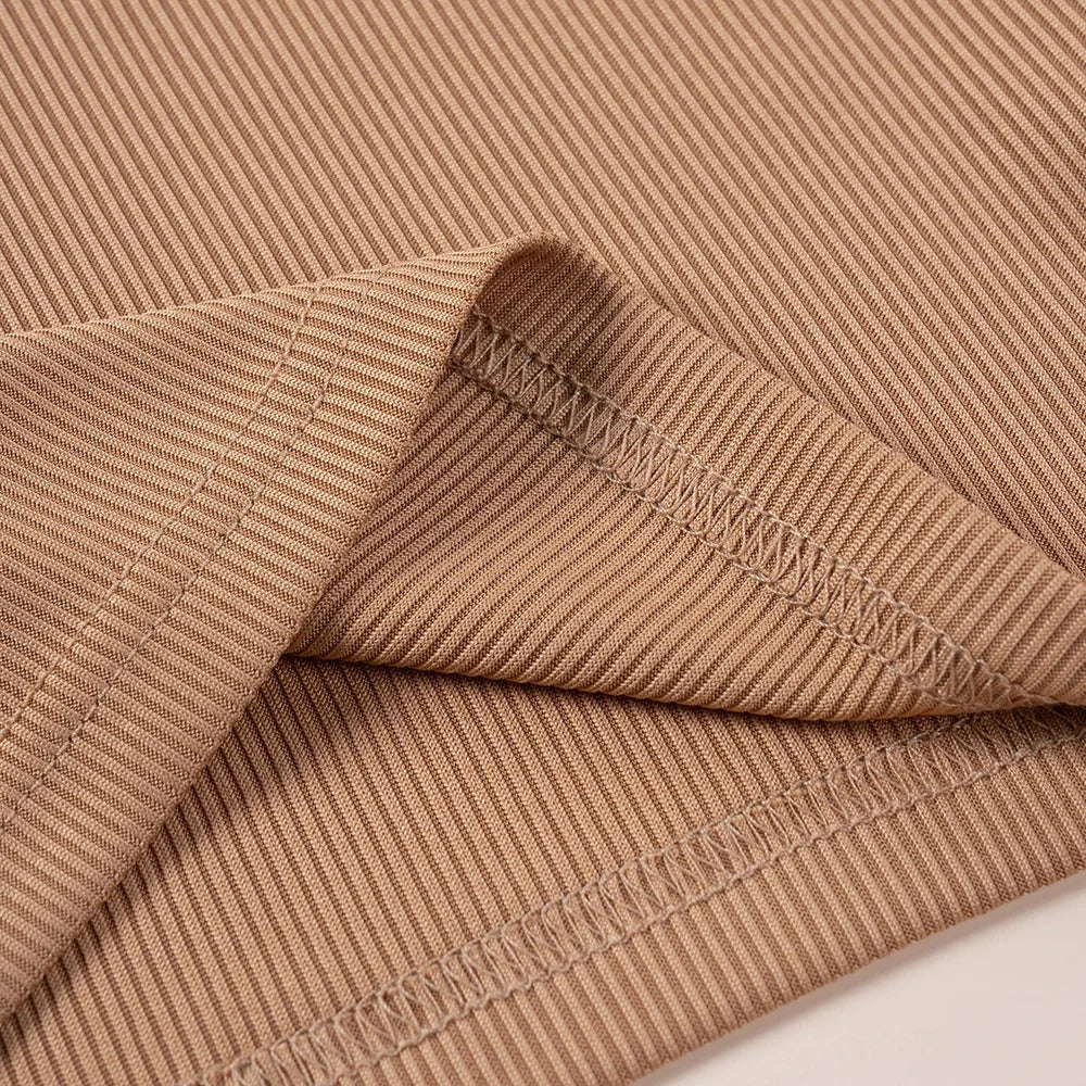 Close-up view of soft beige ribbed fabric stitching for Kids Summer Fashion 2pcs Casual Printed Unisex T-Shirt and Shorts Set