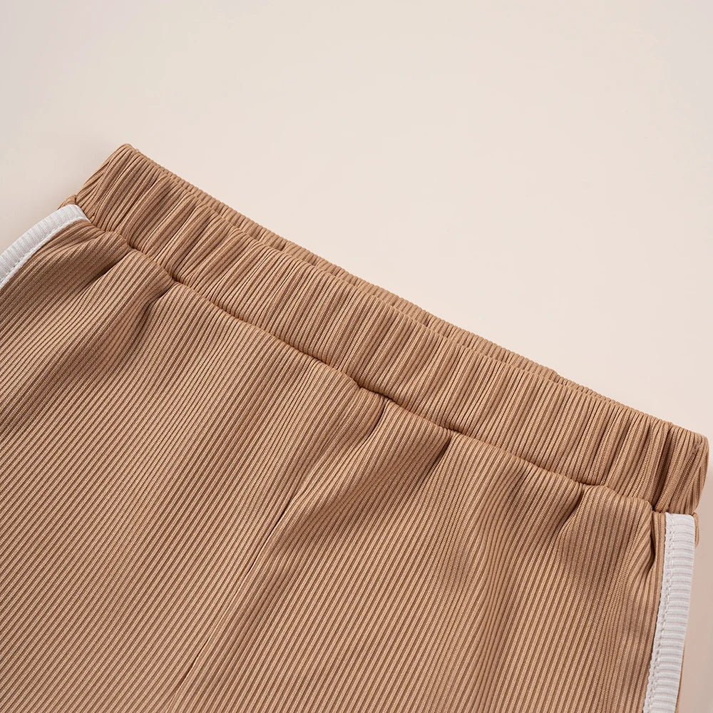 Close-up of brown ribbed elastic waistband shorts from Kids Summer Fashion 2pcs Casual Printed Unisex T-Shirt and Shorts Set