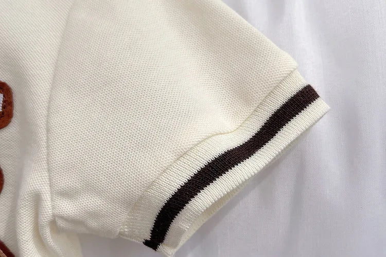 Close-up of sleeve on Kids Summer Short-sleeve Polo Shirt Bear & Striped Shorts Baby Boy Set by Yamza Tots' Closet
