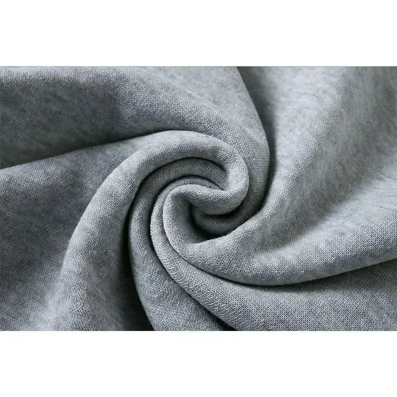 Close-up of soft gray fabric texture for Kids Super Kitties Long Sleeve Sportswear Set Fun and Affordable Outfit