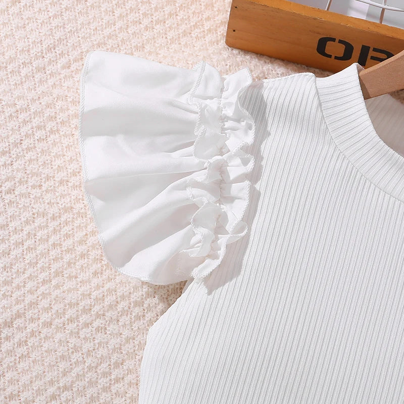 Close-up of white short sleeve top with ruffle detail from Korean Fashion Summer Outfits Kids Girls White Short Sleeve Top Yellow Shorts