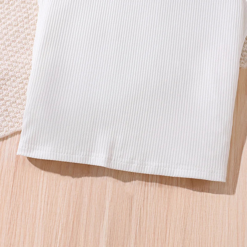 Close-up of white ribbed fabric in Korean Fashion Summer Outfits Kids Girls White Short Sleeve Top Yellow Shorts