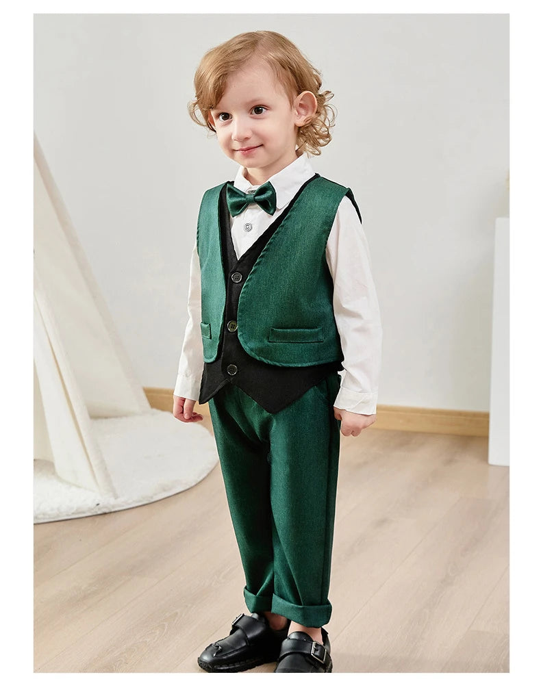 Child wearing green and black Children Top And Bottom Clothing Set Vest & Pants with white shirt and bow tie