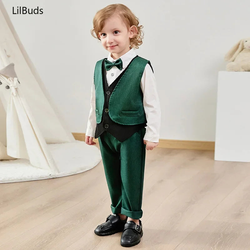 Toddler boy wearing green and black Children Top And Bottom Clothing Set Vest & Pants with white shirt and bow tie
