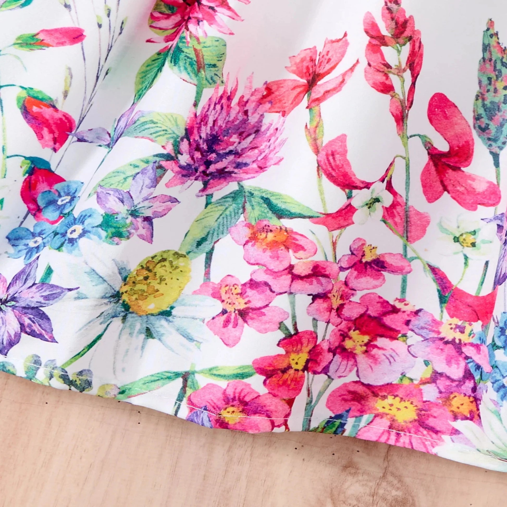 Fashion Girls Dress Summer Casual Patchwork Cowboy Butterfly Floral Design close-up of colorful floral fabric