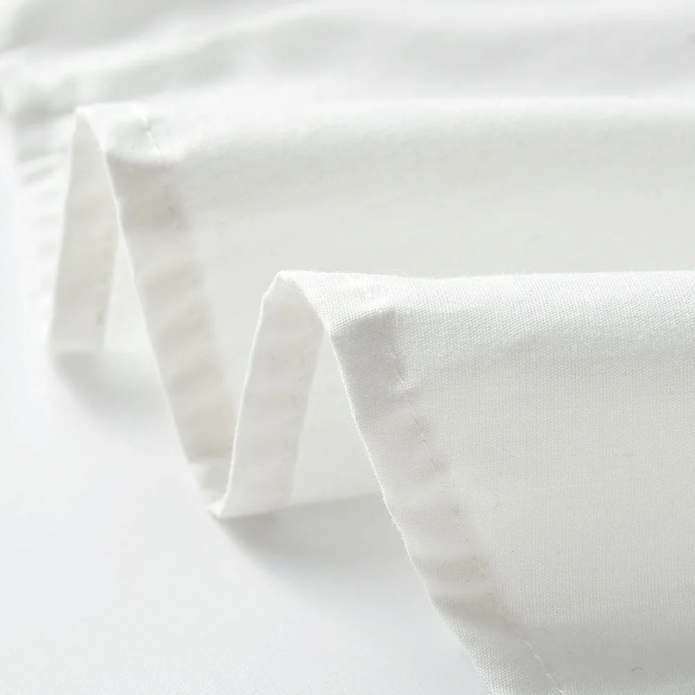 Close-up of soft white fabric used in Baby Boy 3PCS Outfit Set Bow Shirt Vest and Pants Suit for 0-7 Years