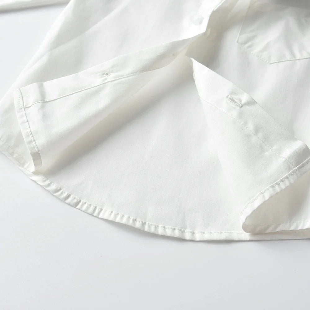 Close-up of white shirt sleeve and hem from Baby Boy 3PCS Outfit Set Bow Shirt Vest and Pants Suit for 0-7 Years