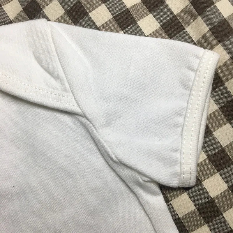 Close-up of white short sleeve fabric from Newborn Baby Clothes Breathable Cotton Short Sleeve Romper I Love PAPA MAMA
