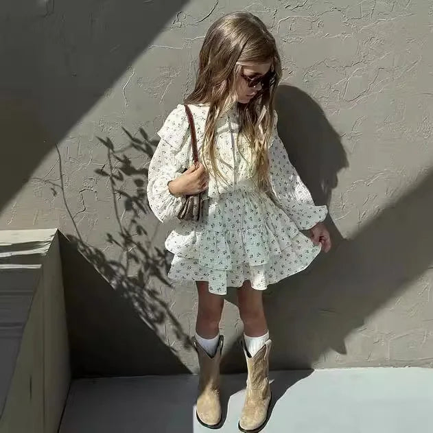 Fashion Baby Girl Clothes Set Floral Blouse and Layered Skirt 2PCS Outfit worn by girl with sunglasses and boots  