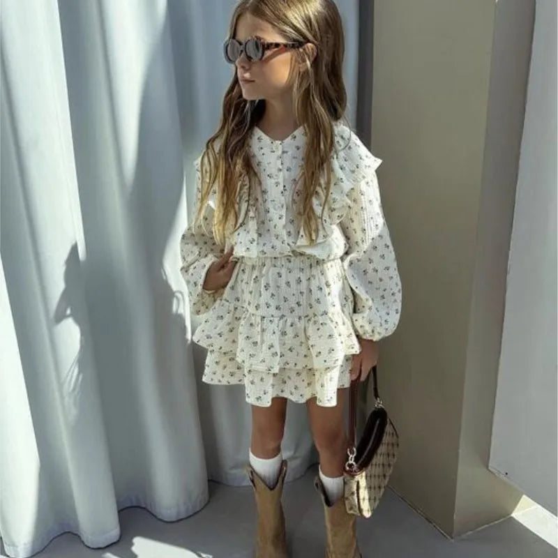 Fashion Baby Girl Clothes Set Floral Blouse and Layered Skirt 2PCS Outfit worn by child with sunglasses and boots 