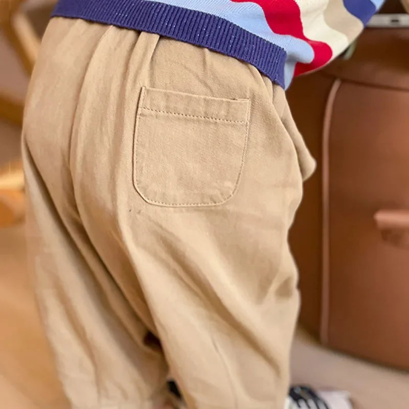 Solid Kids Fashion Trousers Casual Loose Pocket Ankle Length Pant for Boys Girls in beige color with back pocket