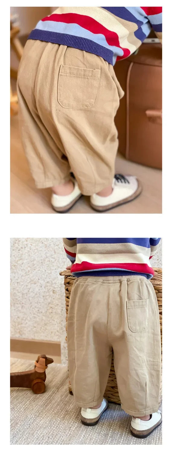 Solid Kids Fashion Trousers casual loose pocket ankle length pant for boys girls in beige color worn by child