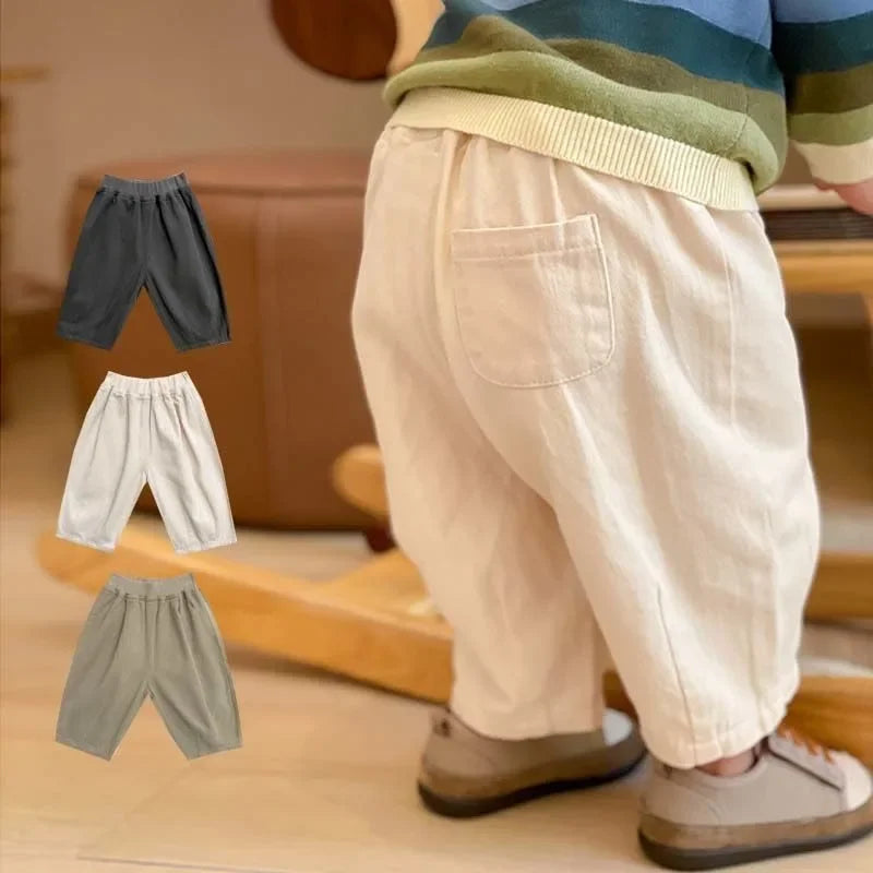 Solid Kids Fashion Trousers Casual Loose Pocket Ankle Length Pant for Boys Girls in beige with elastic waistband