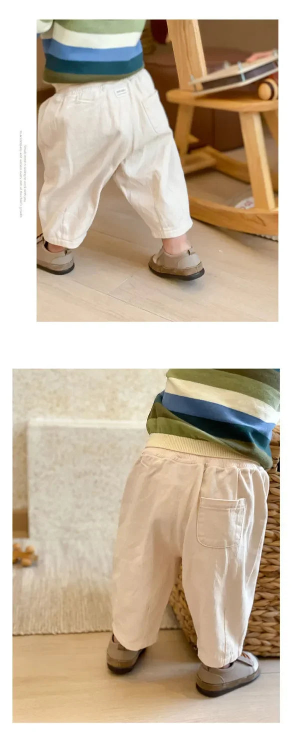 Solid Kids Fashion Trousers Casual Loose Pocket Ankle Length Pant for Boys Girls in white worn by child indoors