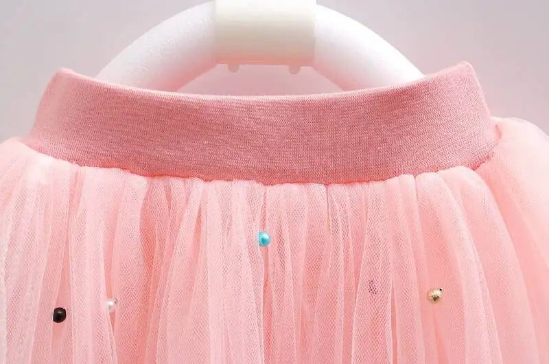 Close-up of pink tulle tutu skirt with embellished details for Girls Summer Dress Set Cute Stitch T-Shirt and Tulle Tutu Skirt Outfit