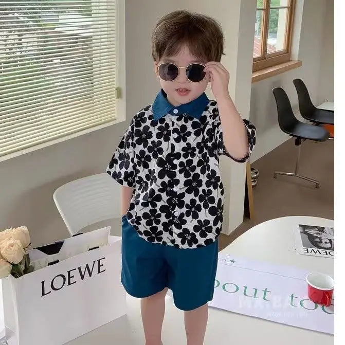 Stylish Flower Suit for Children Baby Short Sleeve Shirt and Casual Shorts Set worn by toddler indoors