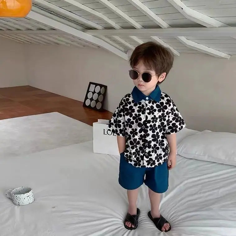 Stylish Flower Suit for Children Baby Short Sleeve Shirt and Casual Shorts Set worn by toddler boy indoors 