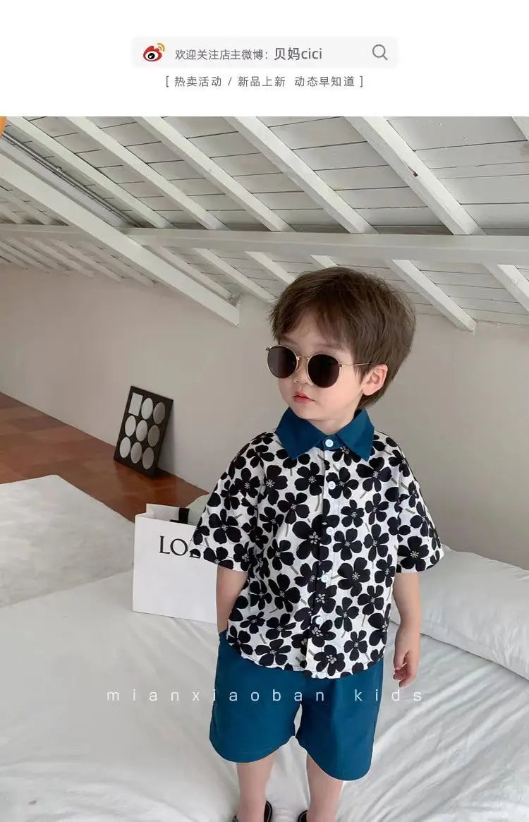 Stylish Flower Suit for Children Baby Short Sleeve Shirt and Casual Shorts Set worn by toddler boy indoors
